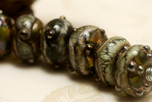 10503401 - Seven Green w/Silver Foil Rondelle Beads