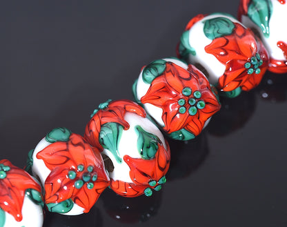 10707801 - Seven Red Poinsettia Christmas Rondelle Beads