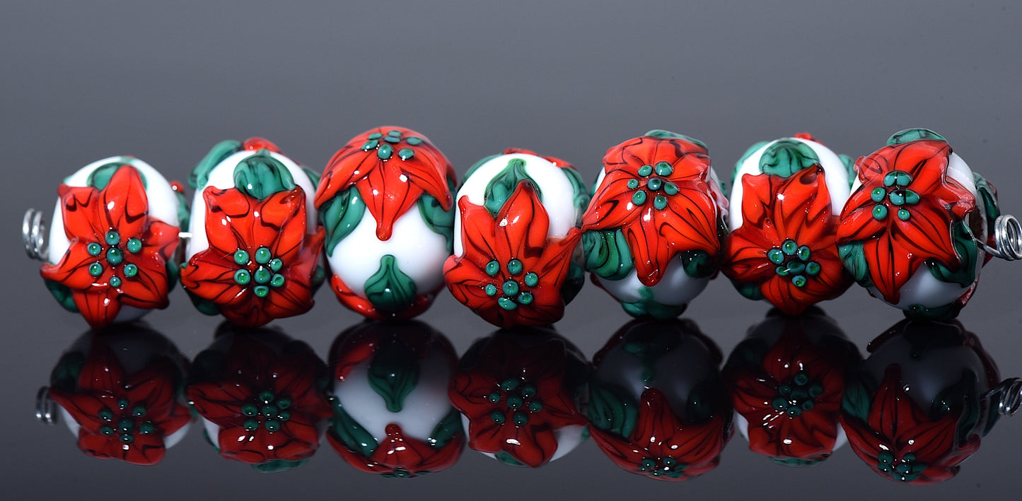 10707801 - Seven Red Poinsettia Christmas Rondelle Beads