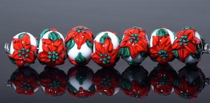 10707801 - Seven Red Poinsettia Christmas Rondelle Beads