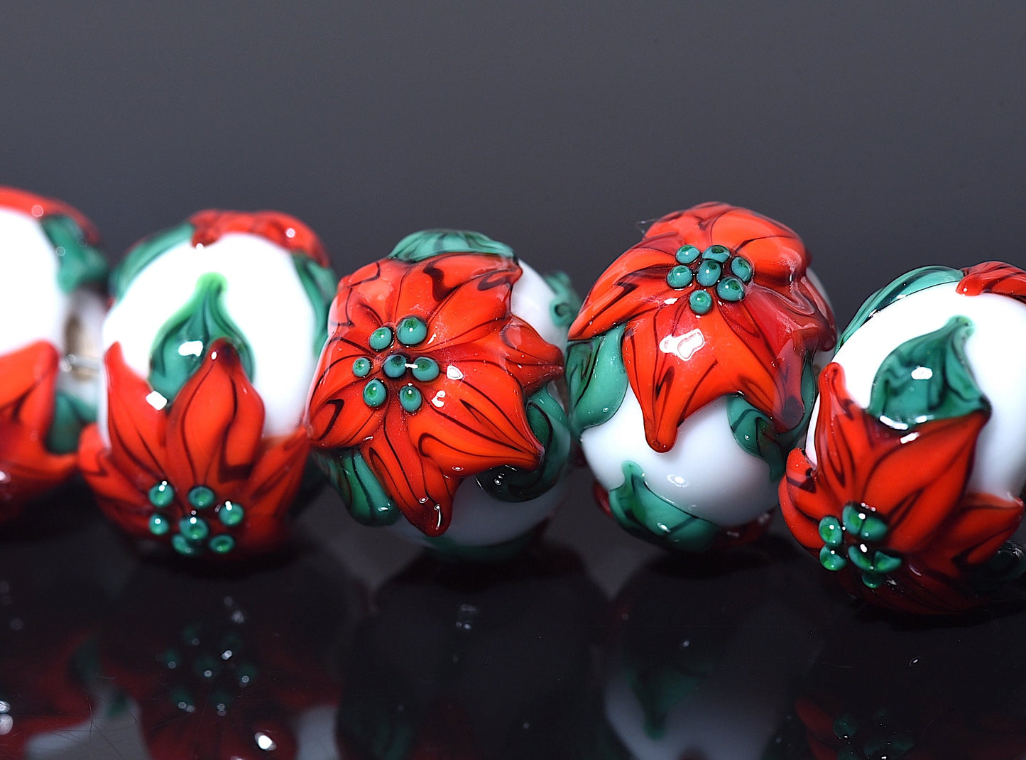 10707801 - Seven Red Poinsettia Christmas Rondelle Beads