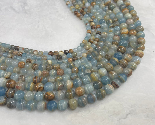 Lemurian Aquatine aka Blue Onyx Calcite, Round