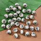 Conch & White Metal Wheel Beads