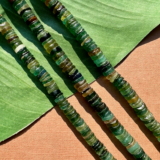 Roman Glass 9mm to 11mm Cylinder Bead Strands