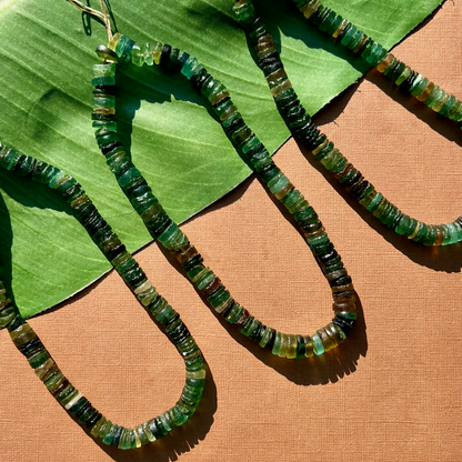 Roman Glass 9mm to 11mm Cylinder Bead Strands