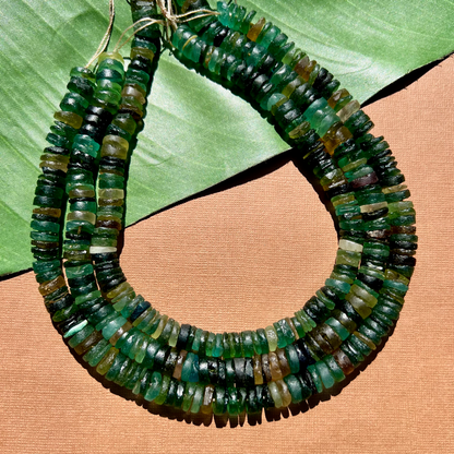 Roman Glass 9mm to 11mm Cylinder Bead Strands