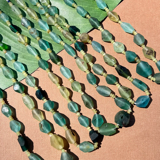Roman Glass Faceted Bead Strands