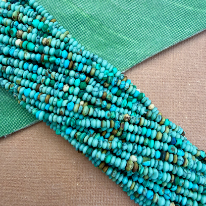Natural Matrix Turquoise Tiny Saucer Beads - 1 Strand