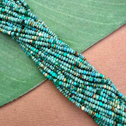 Natural Matrix Turquoise Tiny Saucer Beads - 1 Strand