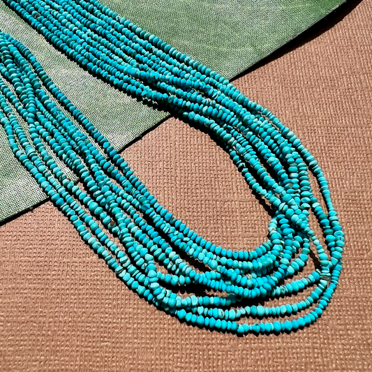 Turquoise Tiny Saucer Beads - 1 Strand