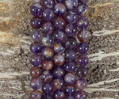 Auralite 23 aka Amethyst w/ Hematite Inclusions Round