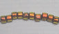 Orange on Black Dichroic Glass Small Tube Beads